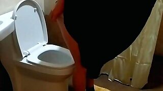 How Muslim girl pissing? Caught pee in toilet.